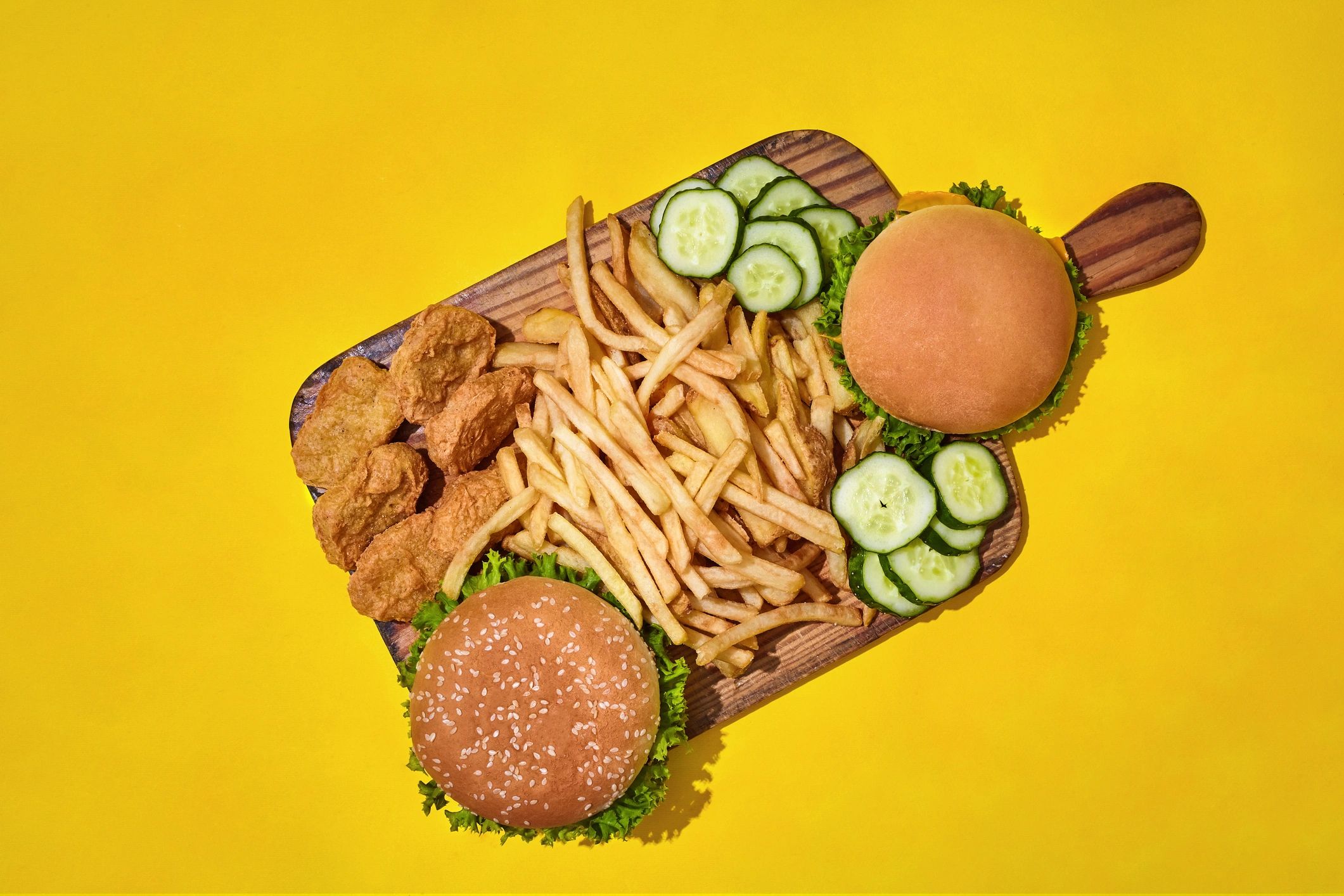 Fast food platter with burgers, nuggets, and fries