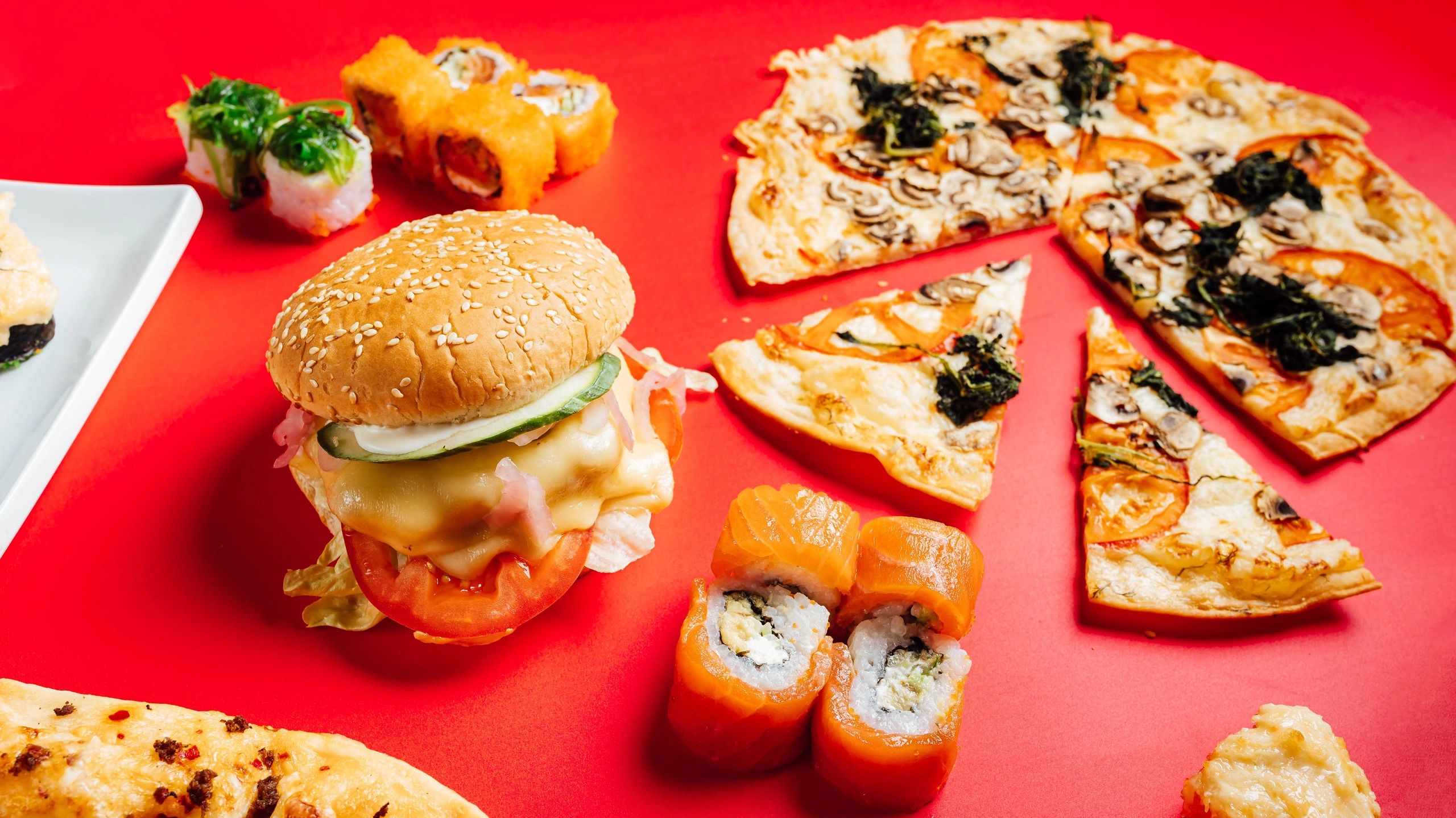 Fast food spread including pizza and burger
